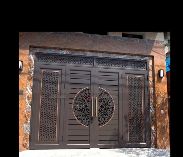 Cổng sắt CNC KD271 – mẫu quốc dân với trống đồng và hoa văn bông tuyết